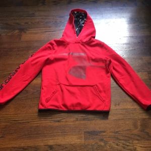 Under Armour red sweat shirt.